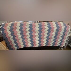 Handmade Crochet Chevron Afghan Blanket in Pink, Blue, and White with tassels.